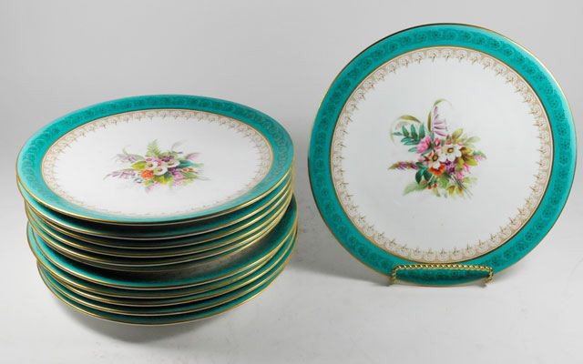 Set of 12 blue floral Royal Worcester plates: 1 cracked. Approx. 9.25" Diam.