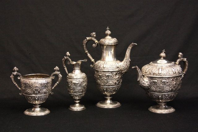 4 piece Victorian sterling silver English tea set: Approx. 82 ozt. 4 piece Victorian sterling silver English tea set. Includes: 1-9.25" H teapot approx. 30 ozt, 1-12.25" H coffee pot approx. 26 ozt, 1-8.5" H creamer approx. 11 ozt, 1-7" H sugar approx