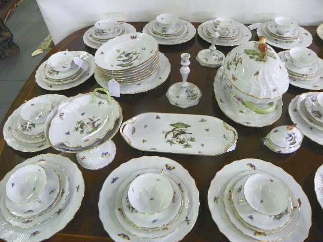 "Rothschild Bird" Herend China dinnerware set: Including: 8- Soup bowls, approx. 9.5". 12- Bread & butter plates, approx. 6". 12- Salad plates, approx. 7.5". 12- Saucers, approx. 5.5". 12- Cups, approx. 4". 12- Dinner plates, approx. 10". 1- Oblon