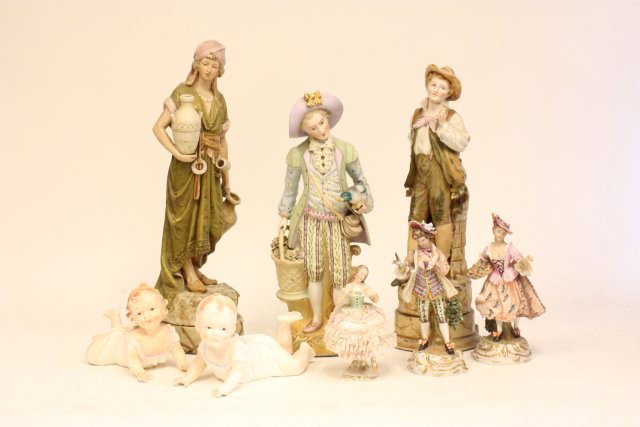 Group lot of 8 various figurines: Including: Pair bisque "Piano Babies", "Boy with Bird", broken finger, Royal Dux "Girl with Pitcher Vase", "Boy with Hat", porcelain "Boy & Girl", Dresden "Girl with Flowery Dress". All as is.