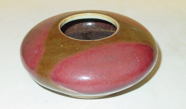 Chinese oxblood pottery pot: Approx. 2" x 4.75". From a Norwood, NJ estate.
