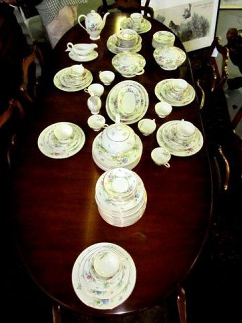Bavarian dinnerware set: Including: gravy boat, round tray, 14 soup bowls, 2 covered round tureens, 3 oval trays, teapot, coffee pot, 1 open round bowl, 12 cups, 12 saucers, 12 bread plates, 16 fruit bowls, 12 dinner plates,