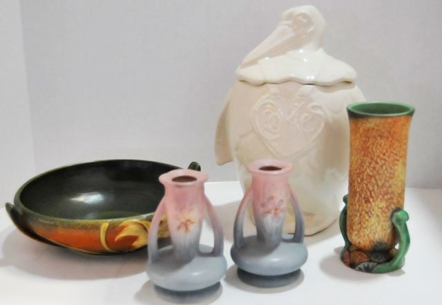 Group lot of 5 assorted smalls: 1- Zephyr Roseville bowl, approx. 2.75" H x 8.75" Diam. 2- Candle holders marked Hull, approx. 5" H each. 1- Penguin cookie jar marked McCoy, approx. 11.5" H. 1- Vase marked Weller Pottery, approx. 7"