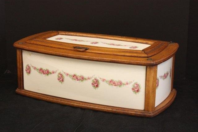 Porcelain decorated "Bread Box": With wood frame. Approx. 18.5" W x 10.5" D x 6.5" H. Please read our terms of sale.
