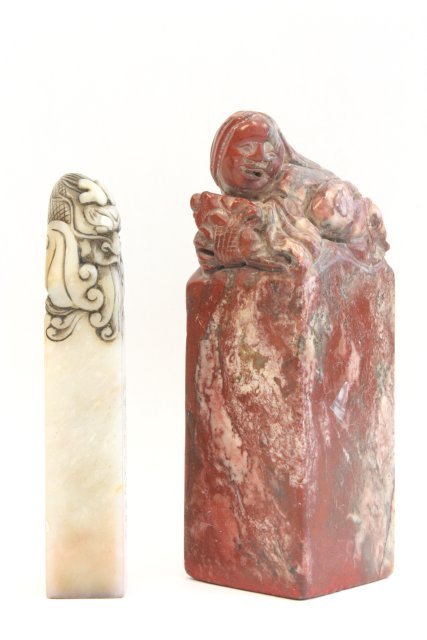 2 figural soapstone seals: 1- Red with figure of "Man", approx. 4.25" H. 1- White with "Face of Bearded Man", approx. 3.75" H. Please read our terms of sale.