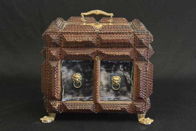 Early 20th c. tramp art box with brass claw feet: Good condition. Approx. 11" x 13" x 9".