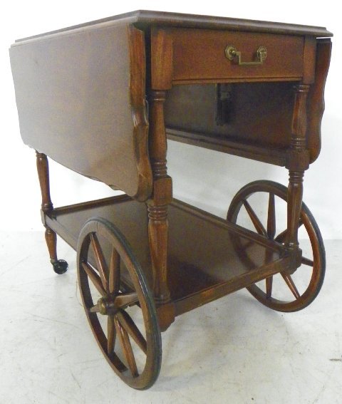 Cherrywood tea cart with drop sides: Approx. 28" H x 18" W x 28" L