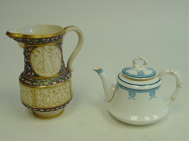 Royal Worcester teapot & Fischer pitcher: Teapot is blue & white, approx. 4.5" x 7" handle to spout. Pitcher Budapest has gold mark, approx. 7" H.
