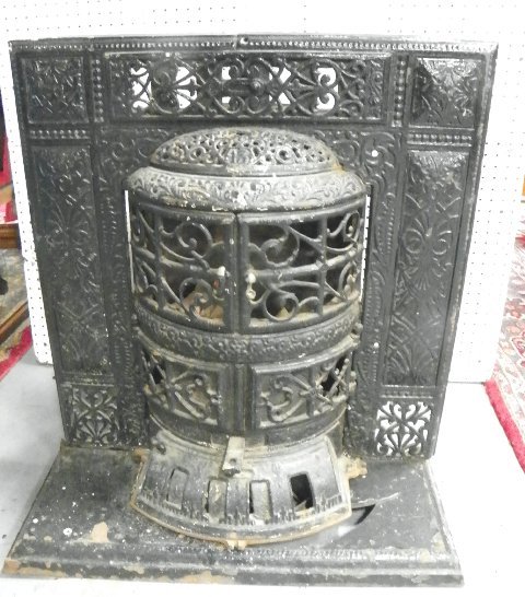Cast iron coal stove fireplace insert: Made by Grand Social No. 13 Floyd Wells & Co. Royersford Pa.