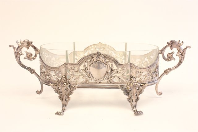 Silver plate filigree figural centerpiece: With glass insert, Portugal. Approx. 5.5" H x 15.25" W x 15.5" D.