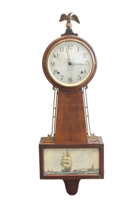 Mahogany Sessions banjo clock: With key & pendulum. Approx. 27" x 9.25" W.