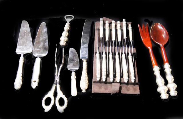 Sterling silver lot of 19 serving pieces: Including: Tongs, salad set, bread knife, bottle opener, 11 dinner knives & 1 butter knife. From a Sutton Place, NYC estate.