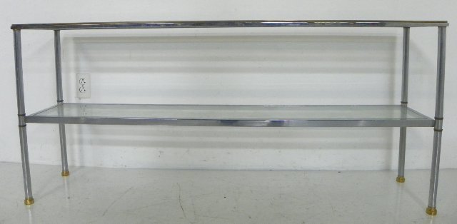 Mid-century chrome & brass 2 tier sofa table: With glass shelves. Approx. 27" H x 60" L x 13" D. From Sutton Place, NYC estate.