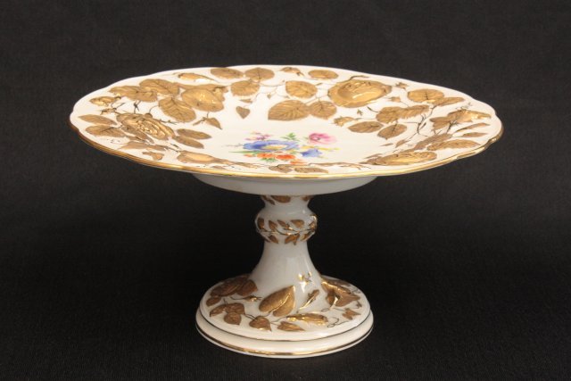 Meissen compote: Floral decorations & gilded leaves around it. Approx. 5" H x 10" W