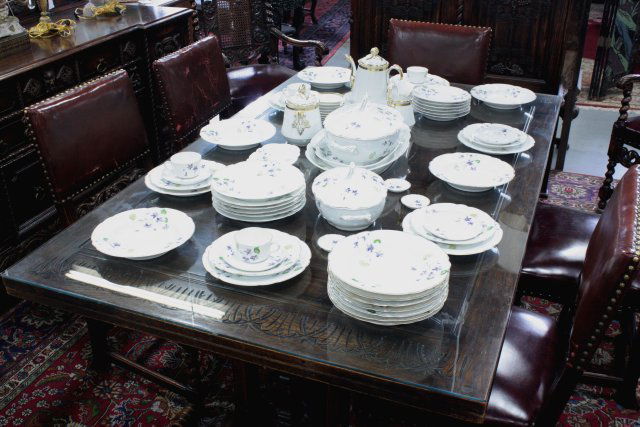 Victorian 70 piece dinnerware set: Including: 12 dinner plates (2 cracked), 12 soup bowls (2 cracked, 1 chipped), 12 cake plates (1 cracked), 1 soup tureen, 2 platters (1 cracked), 1 covered vegetable bowl, 1 pickle dish, 4 cups (3 cra