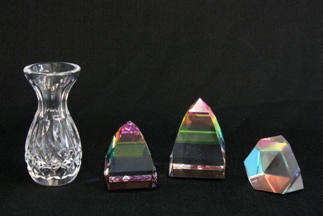 9 pcs lot of Swarovski & Waterford Crystal: 6- Lismore pattern violet vases in boxes, approx. 3.5" H. 3- Obelisks, 2 approx. 2.5" H & 1 approx. 1" H.