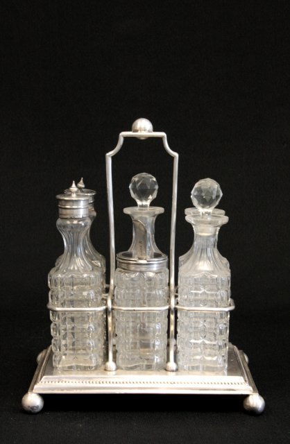 Silver plate cruet set with 6 cruets: Silver plate cruet set with 6 cruets Please read our terms of sale.