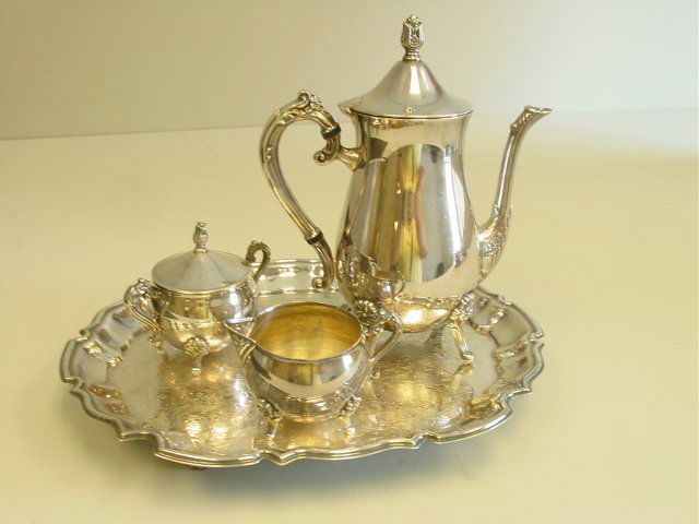 3 piece silver plate tea set on round footed tray: 4 pieces in total. Please read our terms of sale.