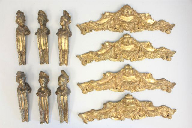 Lot 10 bronze mounts: 4- Gilt bronze mounts, approx. 17" W x 5" H. 6- Figural bronze mounts, approx. 9" H. Please read our terms of sale.