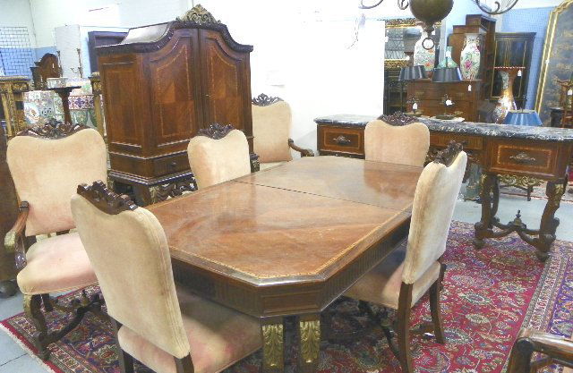 French marble top dining room set: Consisting of: inlaid dining room table approx. 71" x 43" x 27", with 1 leaf. 6 carved & upholstered back chairs- 2 arm & 4 side. Inlaid carved silver chest, approx. 71" H x 40"W. Marble top inlaid &