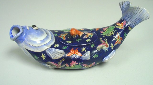 Oriental porcelain handpainted covered casserole: "Fish", handpainting of "Butterflies", "Fish" finial, artist signed. Approx. 15.5" x 8" D x 7" H. From the estate of prominent antique collector from Brooklyn Heights, NY. Please read our terms of sal