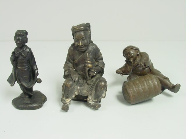 3 Oriental bronze figures: Including: 1- "Man with Barrel", artist signed, approx. 6.5" H. 1- "Woman", approx. 7.5" H. 1- "Seated Man with Seashell". From the estate of prominent antique collector from Brooklyn Heights, NY.