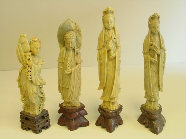 4 soapstone figures: 2 are approx. 12" & 2 are approx. 14". From a private N.Y.C. collector. Please read our terms of sale.
