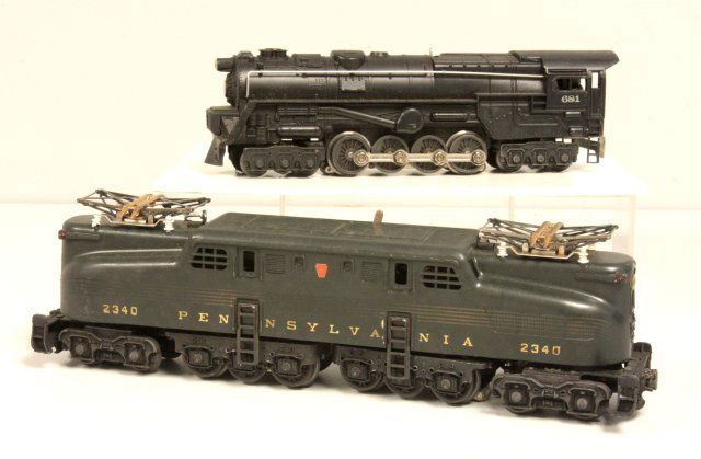 2 Lionel Train locomotives ca. 1949-1953: 1-#2340 Pennsylvania black. 1-#681 Locomotive with smoke Please read our terms of sale.
