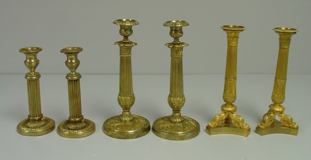 3 pair dore bronze candlesticks: Approx. 8", 10" & 11" H. From the estate of prominent antique collector from Brooklyn Heights, NY. Please read our terms of sale.