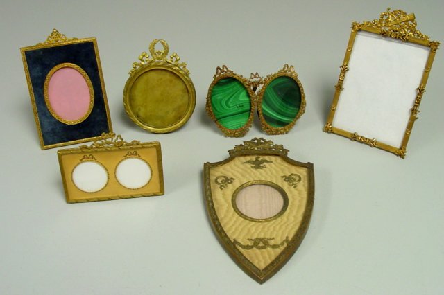Group lot 6 brass & bronze vintage frames: Double & French frames Approx. 3.5" x 4.75" - 7.5" x 4.5". From the estate of prominent antique collector from Brooklyn Heights, NY. Please read our terms of sale.