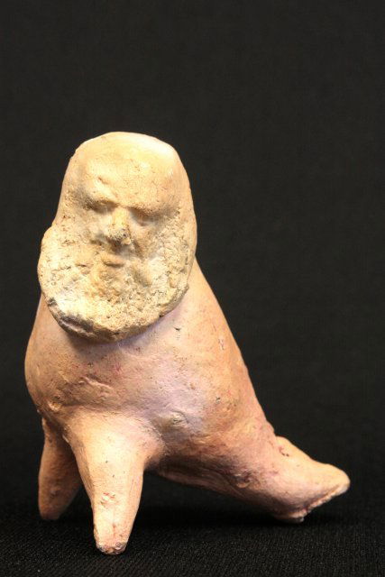 Earthenware whistle of "Bearded Man": Ca. 5th - 6th c. AD, Post Classical Greek, 3 legged with traces of pigment remaining, Aegean Islands. Approx. 3.25" H. Please read our terms of sale.