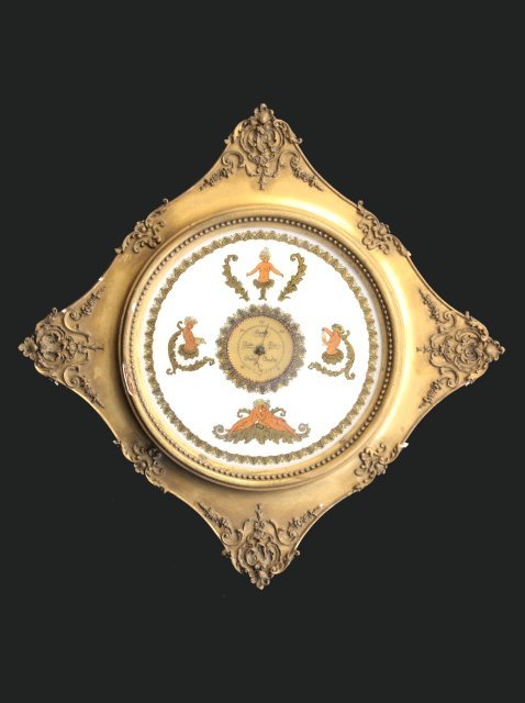 German barometer: With surround scenes reverse painted "Cherubs", surrounded by a 19th c. gilt frame. Approx. 21" square. Please read our terms of sale.