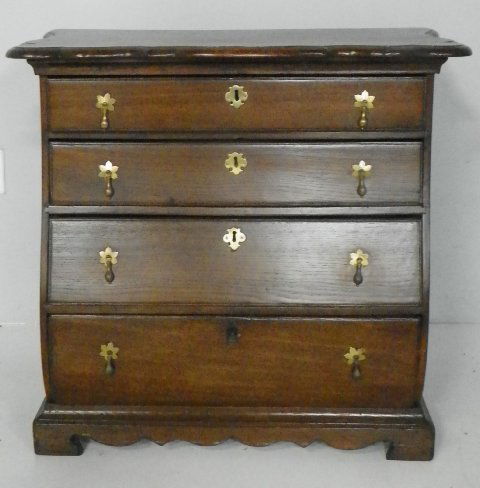 Dutch or German antique oak kettle based dresser: 4 drawers, split in wood on side. Approx. 33" x 18.5" D x 30.5" H. Please read our terms of sale.