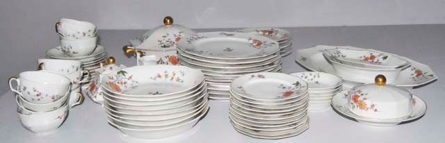 69 piece Limoges, France dinnerware: A. Lanternier & Co. Including: 8- soups, 7- Luncheon plates, 10- Dinner plates, 11- Under plates, 10- Saucers (2 with flakes), 11- Cups (1 with interior line), Creamer & sugar, 3- Trays, approx. 8.5" 