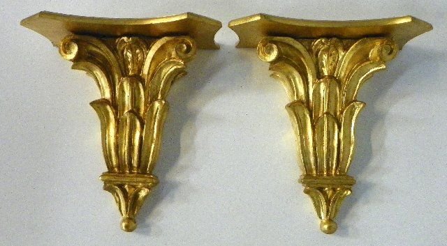 Pair Neoclassical gilt wall brackets: Approx. 15" H x 13.5" W x 7" D Please read our terms of sale.