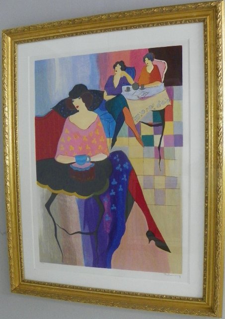 Lithograph by Tarkay "Three Seated Women": In gold frame. Approx. 26" x 36" Please read our terms of sale.