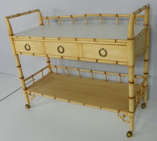 Faux bamboo server/bar labeled Thomasville: Approx. 18" D x 37" H x 44.5" W. Please read our terms of sale.