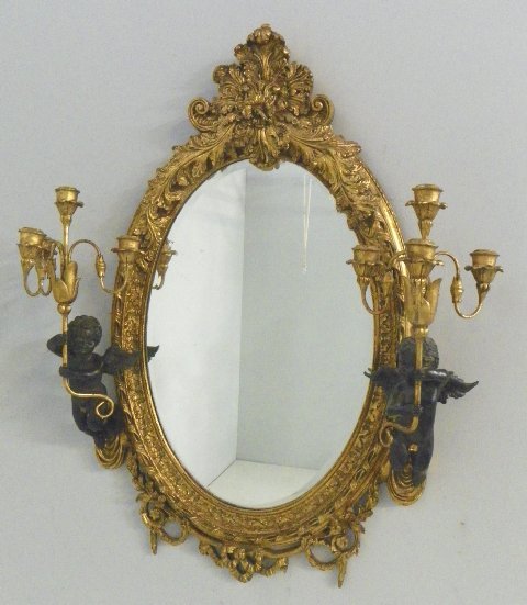 19th c. heavily carved mirror: With "Cherub Angels Holding a 4 Candle Light Fixture". Please read our terms of sale.
