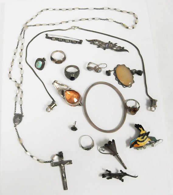 Group lot of sterling silver: Including: Crucifix, bangle, 2 bar pins, Lizard pin, 3 rings, 2 pendants, 2 pair earrings, perfume funnel, eyeglass holder & enamel bird pin. From a Staten Island, NY estate. Please read our terms of 