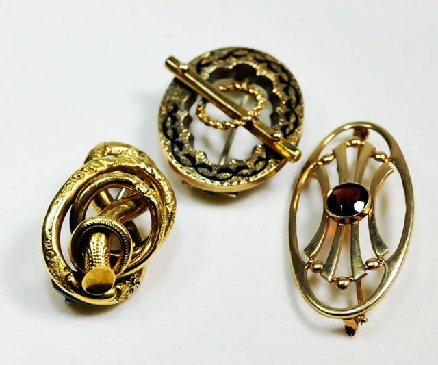 3 pins: Including: 2- 14kt gold, approx 5.1 dwts. 1- Gold filled. Please read our terms of sale.
