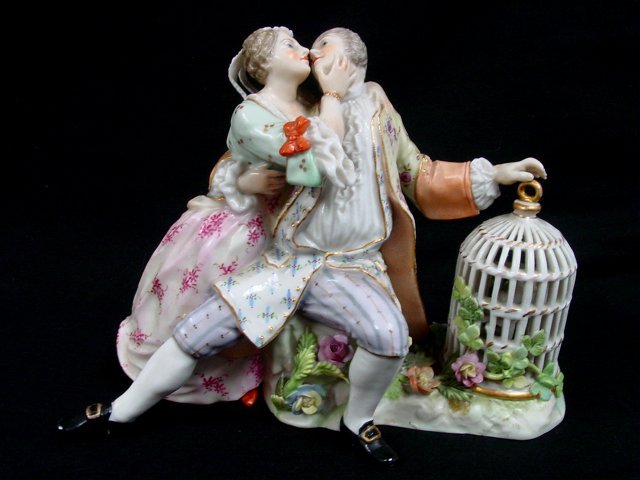 19th c. Carl Thieme porcelain grouping: "Two Lovers with Bird Cage". Approx. 5" H Please read our terms of sale.