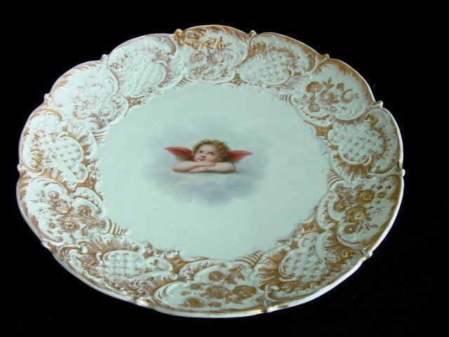 19th c. porcelain Meissen plate "Cupid on a Cloud: Blue cross sword mark, gilt highlights. Approx. 11" D. Please read our terms of sale.