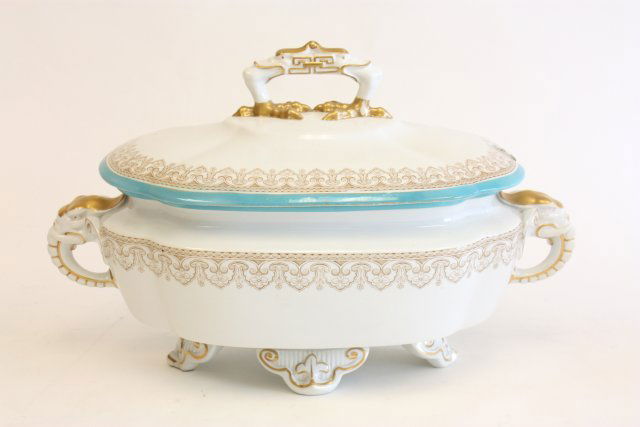 19th c. Royal Worcester covered casserole: With brown mark. With elephant handles, scroll leg & handle on lid depicting grotesque faces. Lip glued. Approx. 15.5" x 10" x 8" H