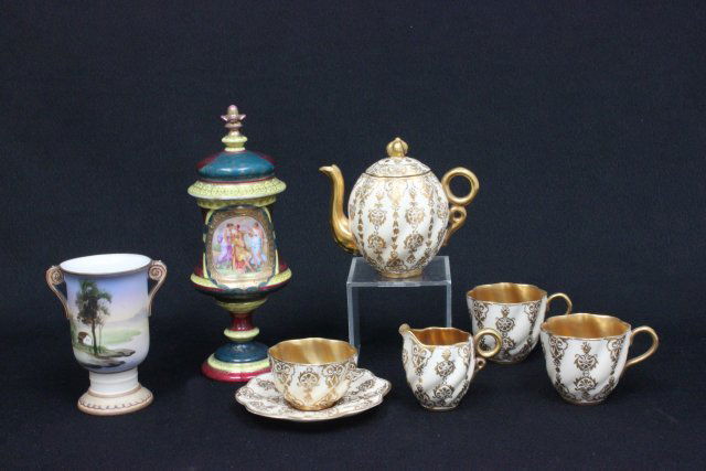 8 pieces of porcelain: Including: Coalport tea set with teapot, sugar, creamer, 2 cups & 1 saucer. Nippon 2 handled mini vase, approx. 4.25" H. Royal Vienna type covered urn, as is, approx. 9" H.