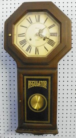 31 day regulator wall clock: In mahogany case. With pendulum & key. Approx. 30" L x 13.5" W.