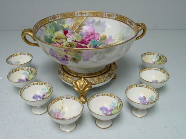 Nippon 2 pc. punchbowl with 8 cups: Handpainted grape & leaf design. Punchbowl approx. 8.75" H x 15" W. Please read our terms of sale.