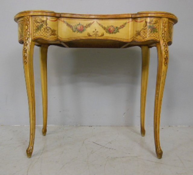 Adams style kidney shaped poudre: Paint decorated. Approx. 29.5" H x 33.75" W x 16.25" D Please read our terms of sale.