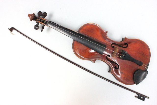Jacobus Stauber in absam prope oenipon violin: 2 piece back, cracks in front, re-stained, with bow, purchased from the Granddaughter of a gentleman who played in the NY Philharmonic Orchestra. Please read our terms of sale.