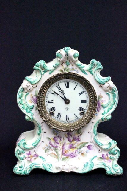 Ansonia porcelain clock: Ansonia porcelain clock Please read our terms of sale.