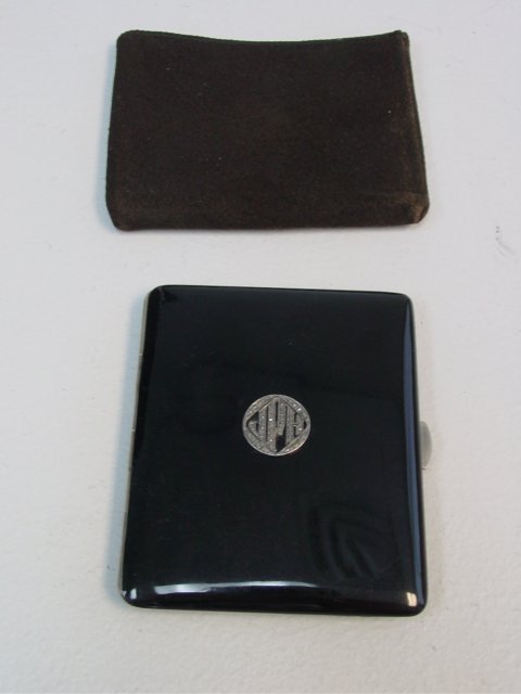 Sterling silver & black enamel cigarette case: With marcasite monogram J.P.H. Approx. 2 5/8" x 3 1/4". Please read our terms of sale.